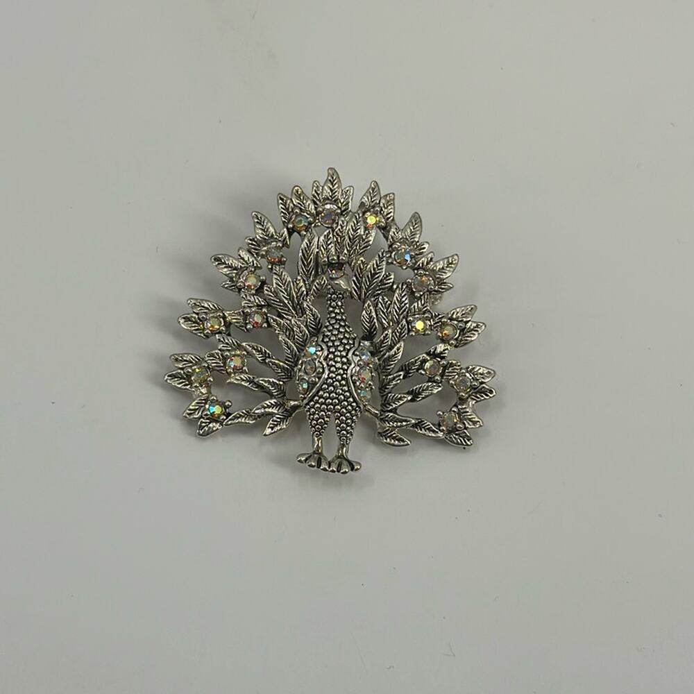 Silver rhinestone peacock brooch
